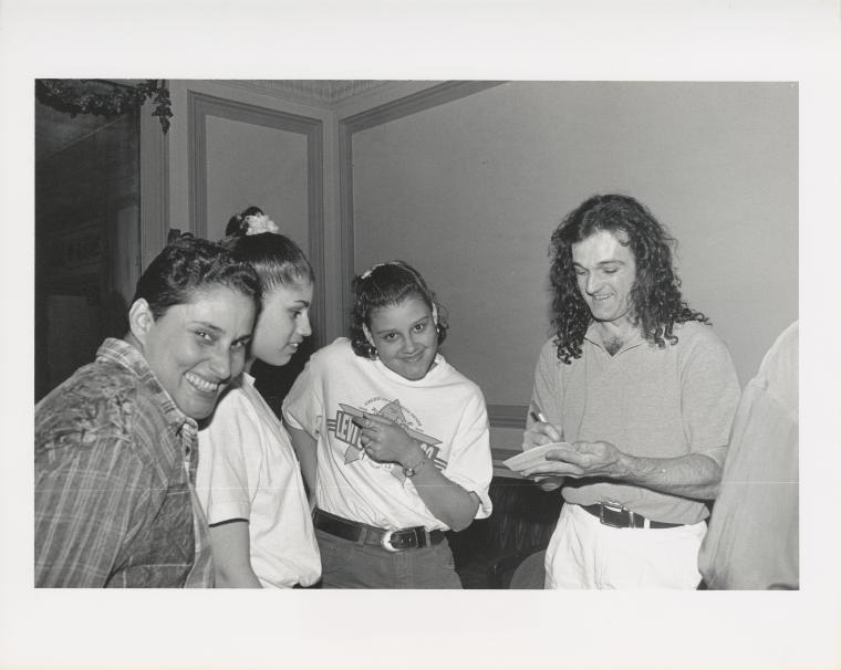 Mark Morris signing a program at a preview performance of "Dances to American Music," 1993